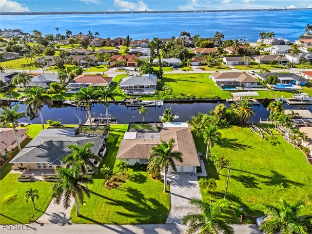 a view of a swimming pool with a garden