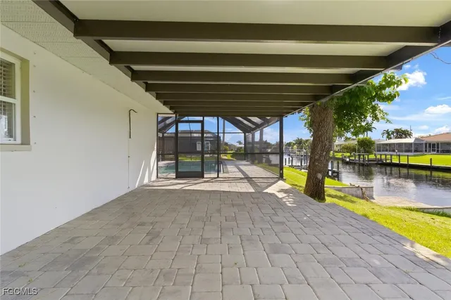 a view of swimming pool with seating area