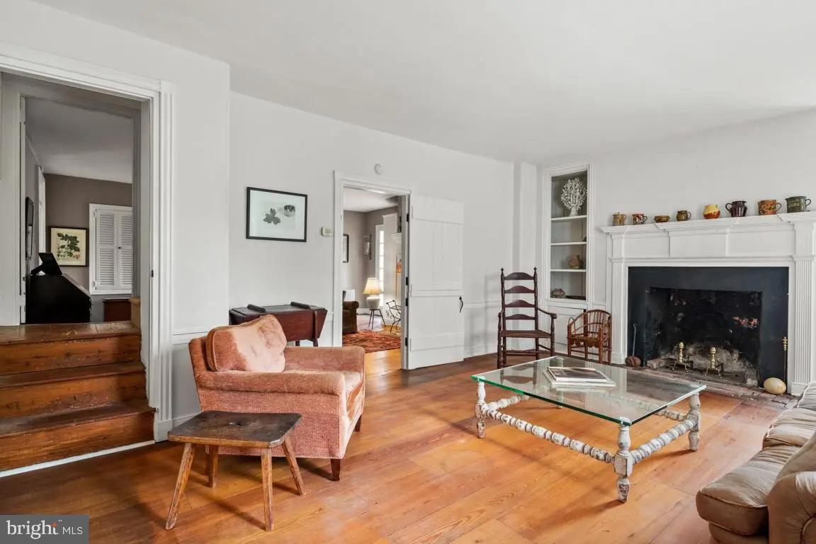 665 Lewis Lane Blue Bell, PA 19422 - Photo 7 of 14 a living room with furniture and a fireplace