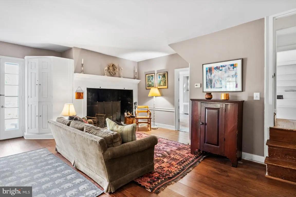665 Lewis Lane Blue Bell, PA 19422 - Photo 9 of 14 a living room with furniture and a fireplace