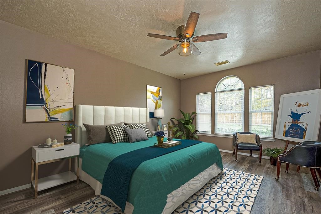18923 Crescent Fountain Road Spring, TX 77388 - Photo 14 of 27 Beautifully staged master bedroom