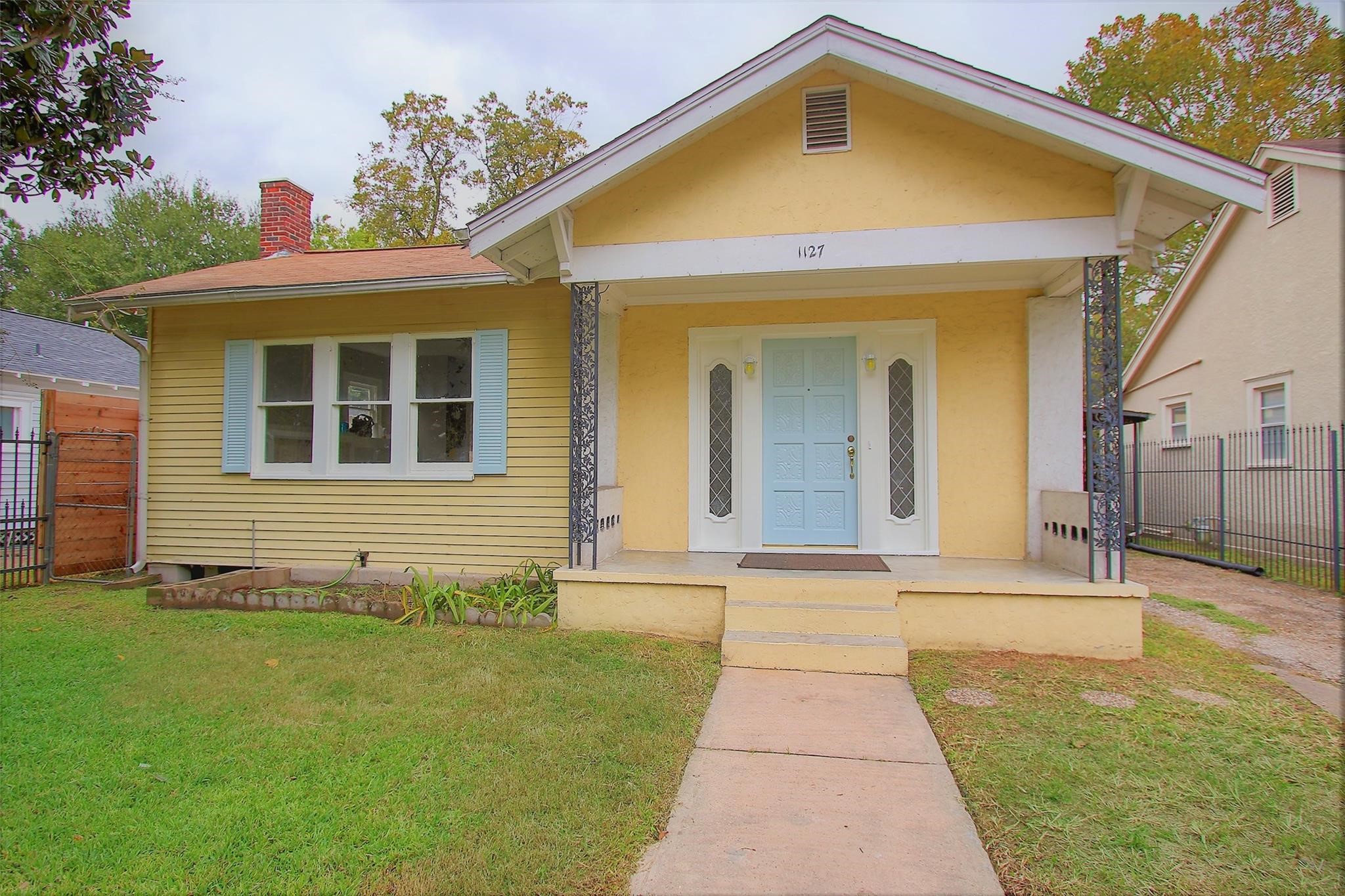 1127 Walling Street Houston, TX 77009 - Photo 23 of 23 a front view of a house with a yard