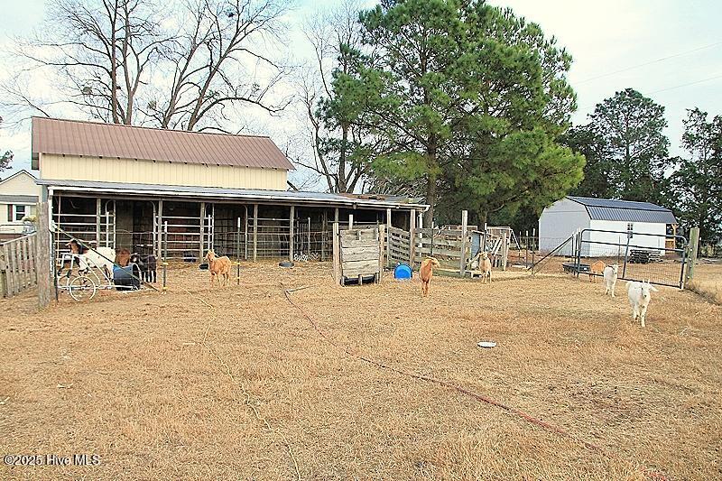 4 Back of Barn and Storage Building