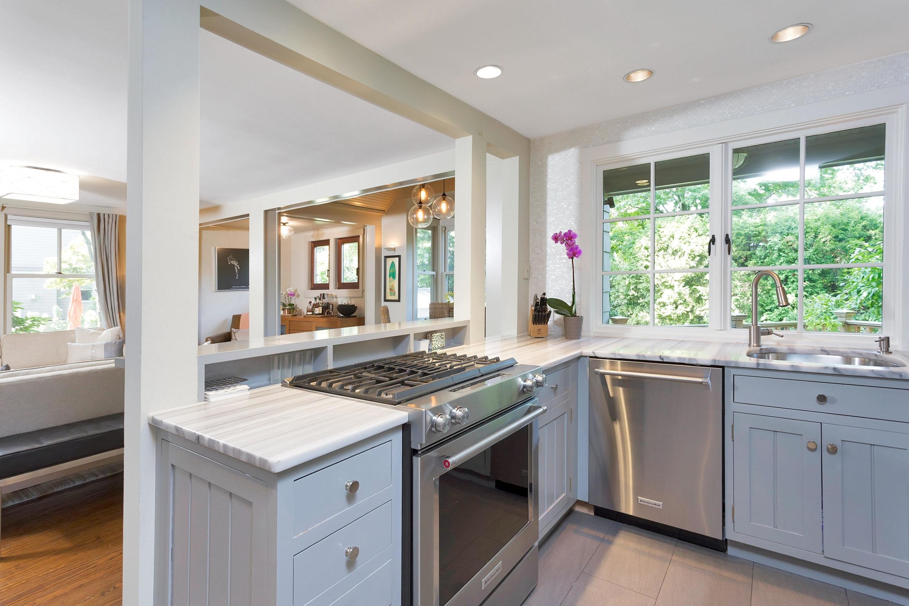 12 Crest Road Rowayton, CT 06853 - Photo 13 of 35 a kitchen that has a sink and a stove in it