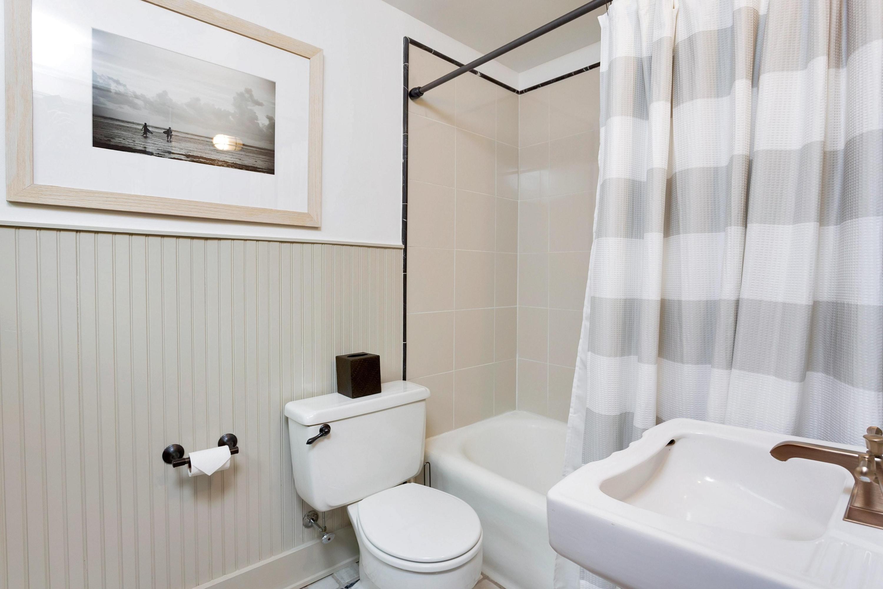 12 Crest Road Rowayton, CT 06853 - Photo 17 of 35 a white toilet sitting next to a bathroom sink