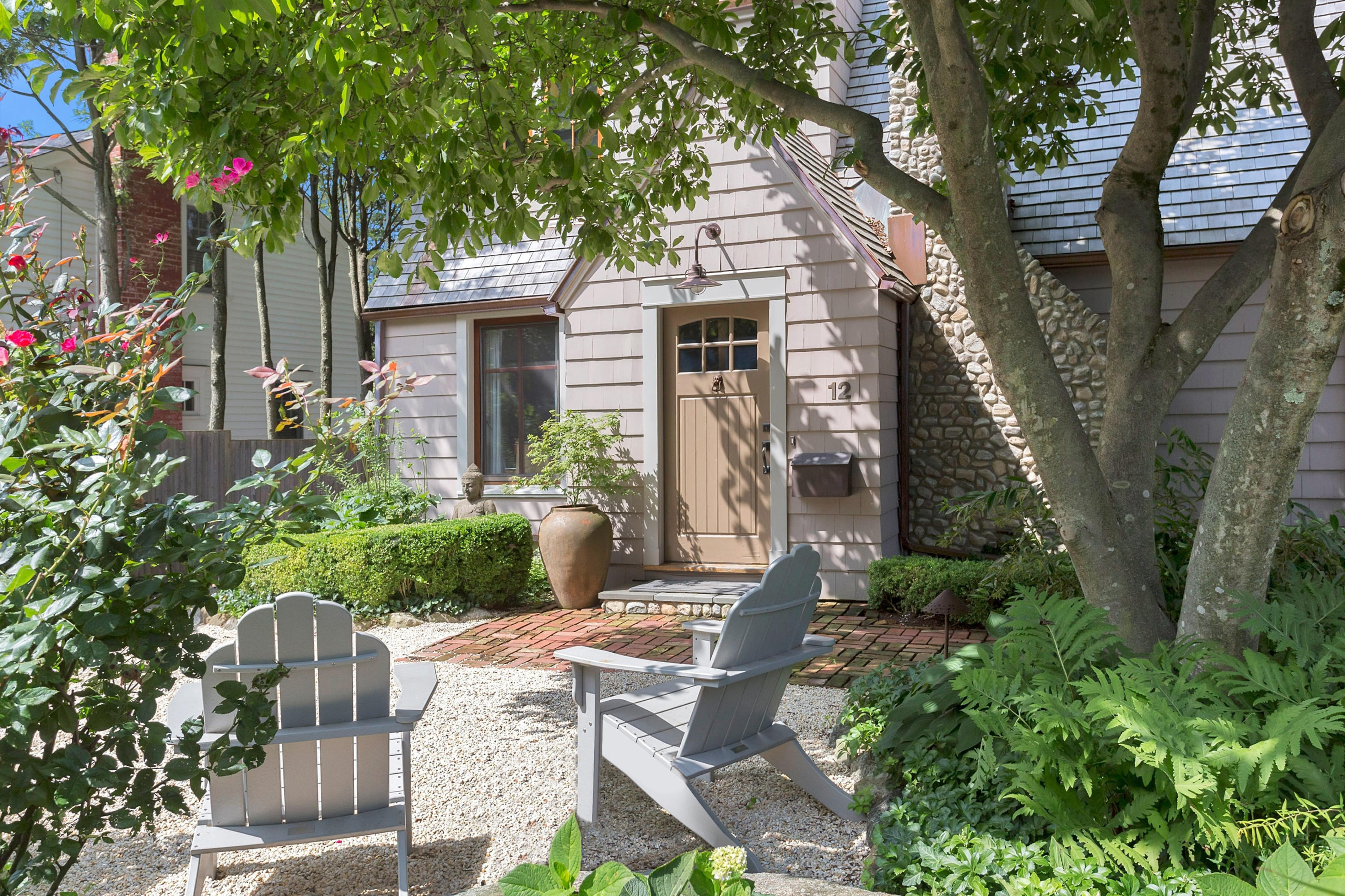 12 Crest Road Rowayton, CT 06853 - Photo 2 of 35 a front view of a house with garden