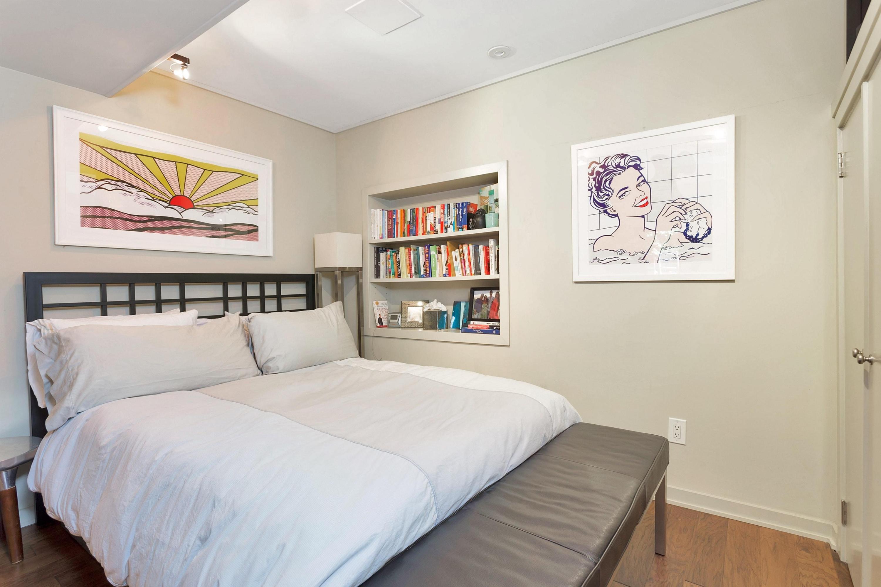 12 Crest Road Rowayton, CT 06853 - Photo 23 of 35 a bedroom with a bed and wall painting