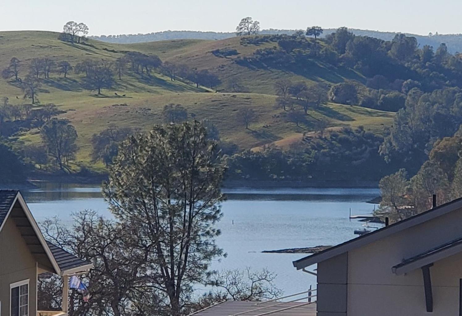 572 Poker Flat Road Copperopolis, CA 95228 - Photo 12 of 31 a view of a house with a mountain in the background