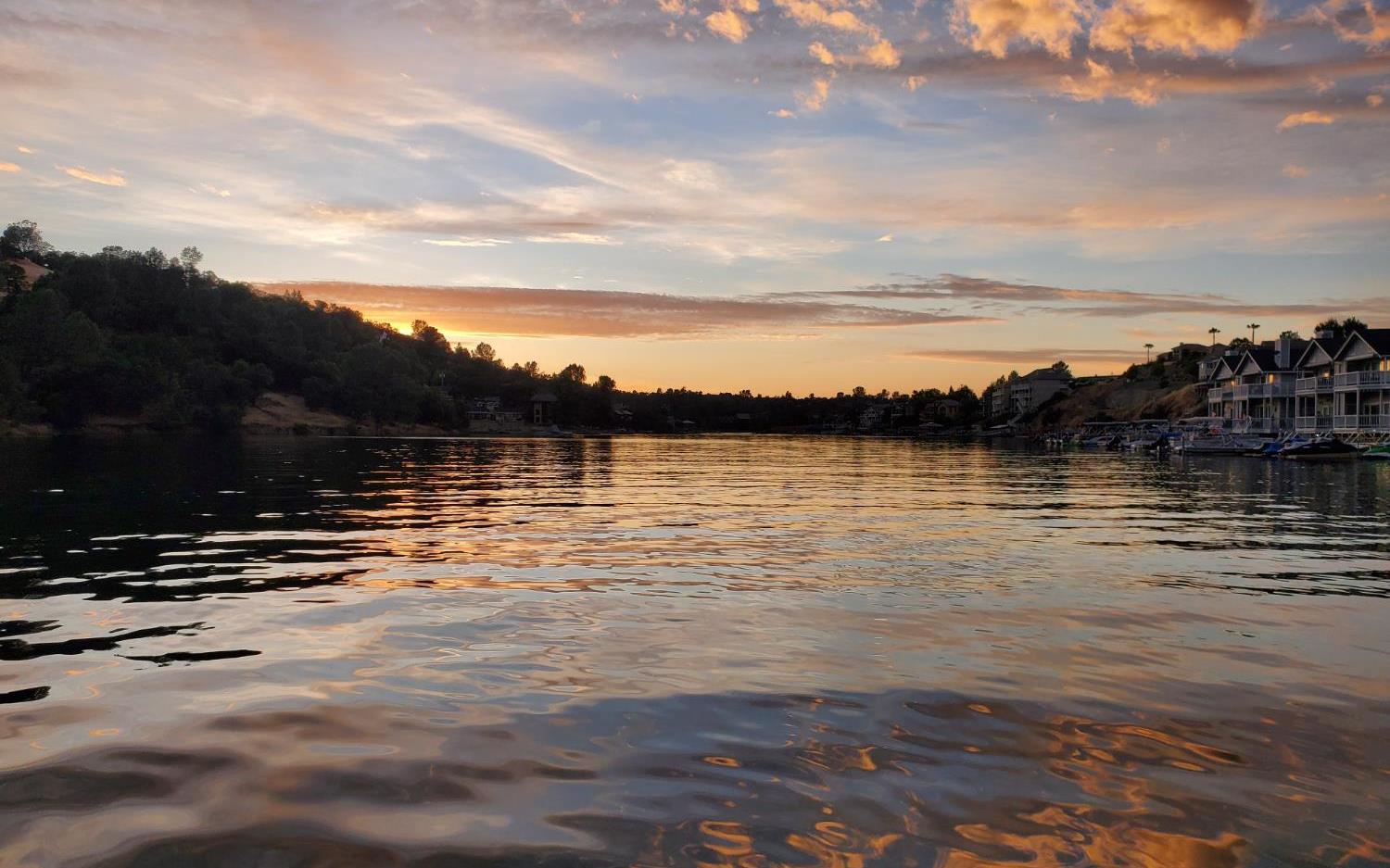 572 Poker Flat Road Copperopolis, CA 95228 - Photo 24 of 31 a view of a ocean with beach