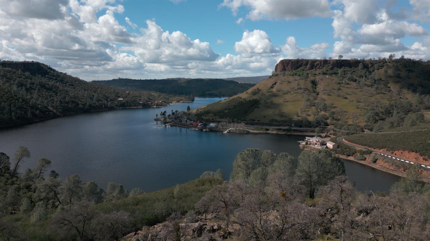 572 Poker Flat Road Copperopolis, CA 95228 - Photo 25 of 31 a view of a lake in middle of forest