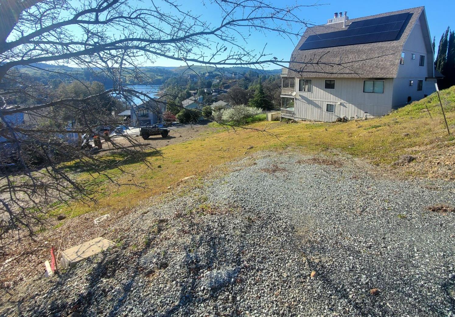 572 Poker Flat Road Copperopolis, CA 95228 - Photo 5 of 31 a view of a house with a yard