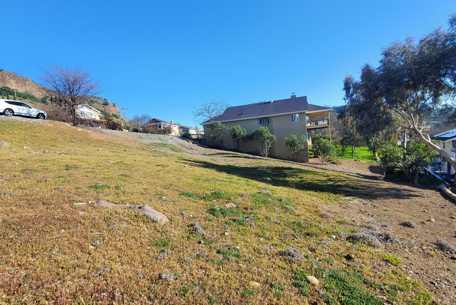 572 Poker Flat Road Copperopolis, CA 95228 - Photo 10 of 31 a view of a road with a building in the background