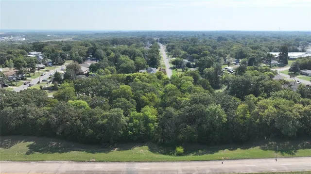 a view of an outdoor space and a mountain view in back