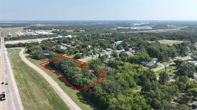 an aerial view of lake and residential houses