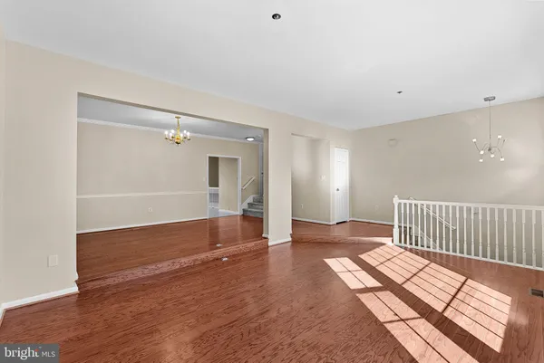 a kitchen with granite countertop a stove and a sink