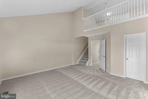 a spacious bathroom with a double vanity sink and a mirror