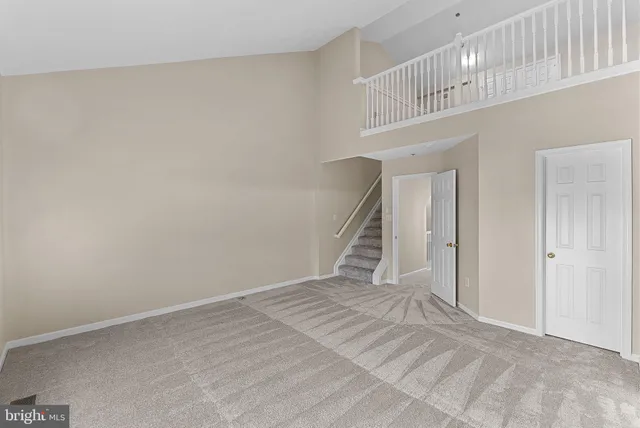a spacious bathroom with a double vanity sink and a mirror