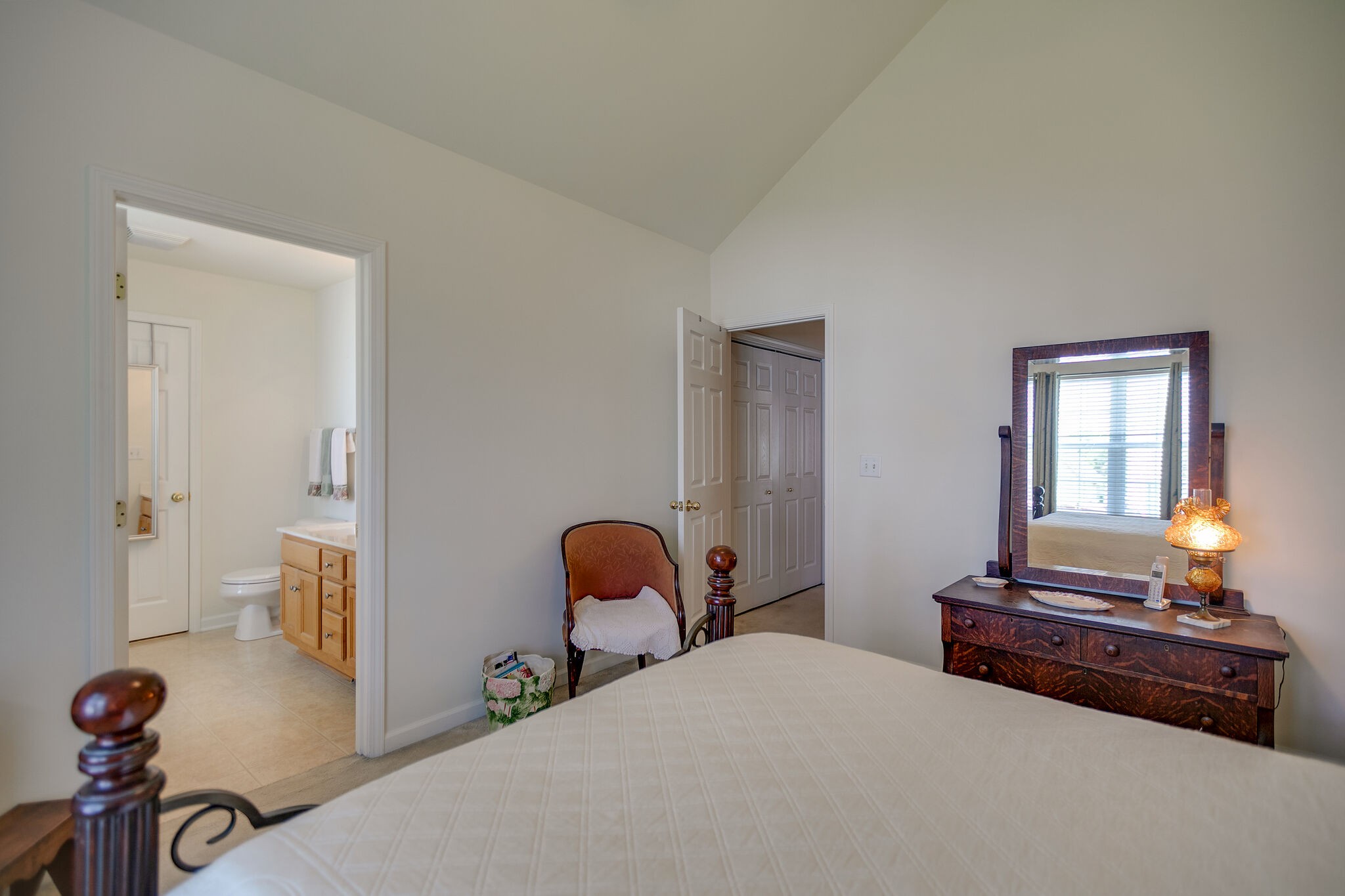 1003 Patterson Street Spring Hill, TN 37174 - Photo 15 of 27 a bedroom with a bed and wooden floor