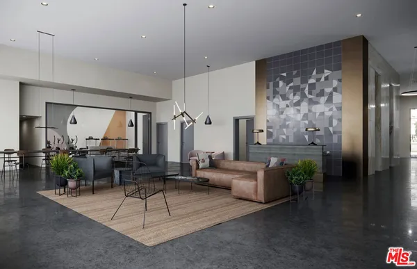 a living room with furniture a large window and a chandelier