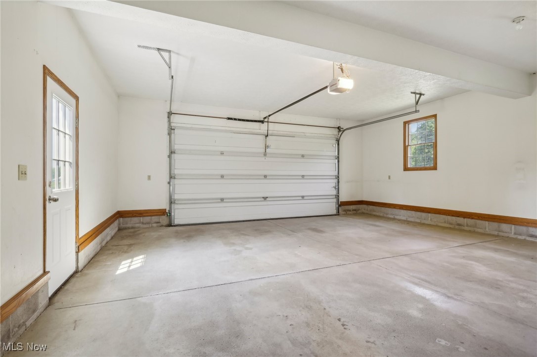 36155 Kinzel Road Avon, OH 44011 - Photo 25 of 38 Attached oversized 2 car garage, automatic lift, man door, keyless entrance