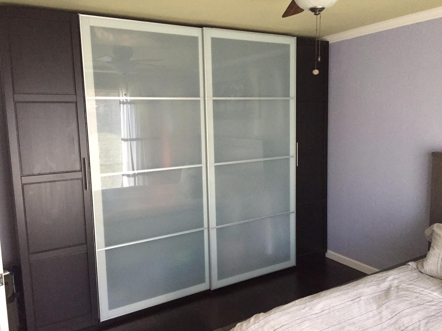 4117 George Avenue, Unit 4 San Mateo, CA 94403 - Photo 15 of 18 a bedroom with a bed and a window