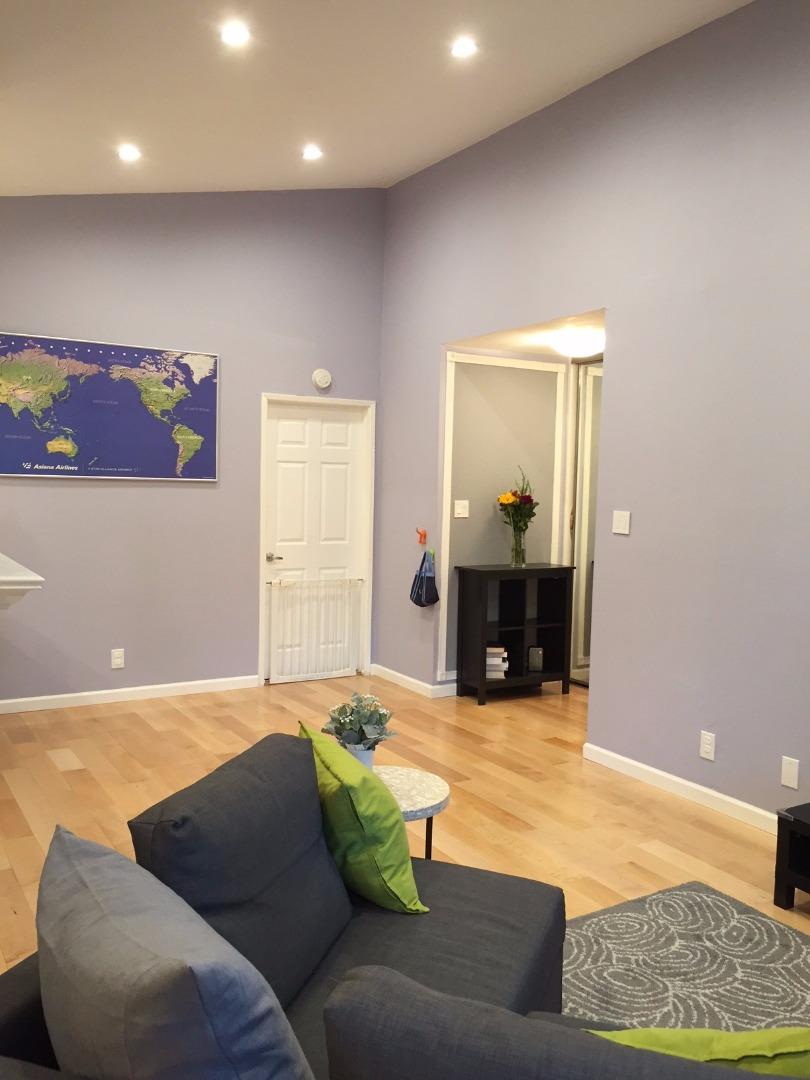 4117 George Avenue, Unit 4 San Mateo, CA 94403 - Photo 5 of 18 a living room with furniture and a fireplace