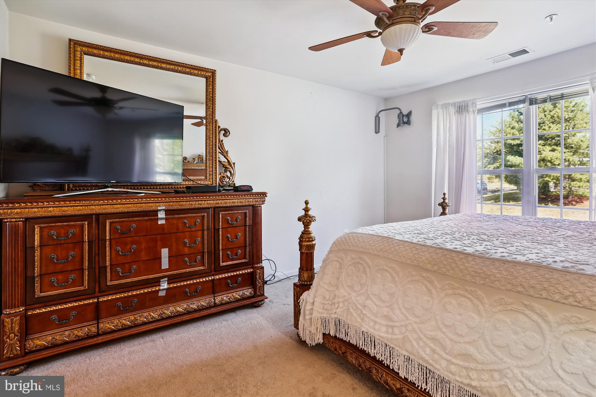 2500 Coleridge Drive, Unit 2A Frederick, MD 21702 - Photo 17 of 60 a bed sitting in a bedroom next to a window