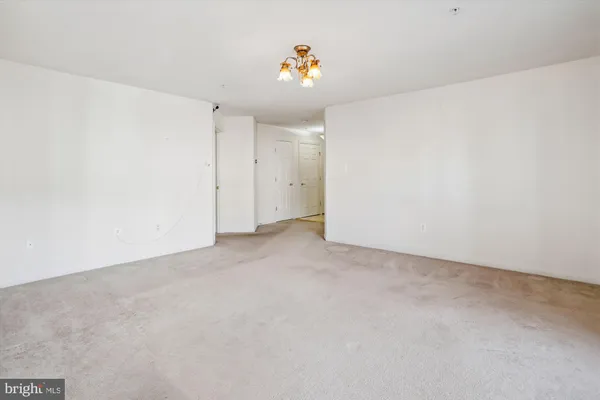 a view of a hallway with closet area