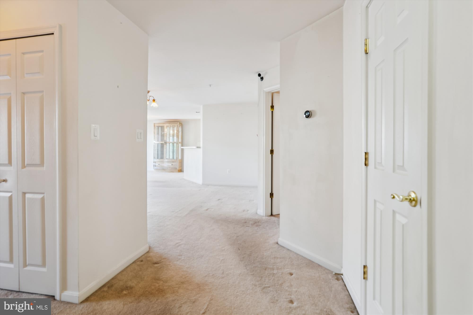 2500 Coleridge Drive, Unit 2A Frederick, MD 21702 - Photo 27 of 60 a view of a hallway with wooden floor