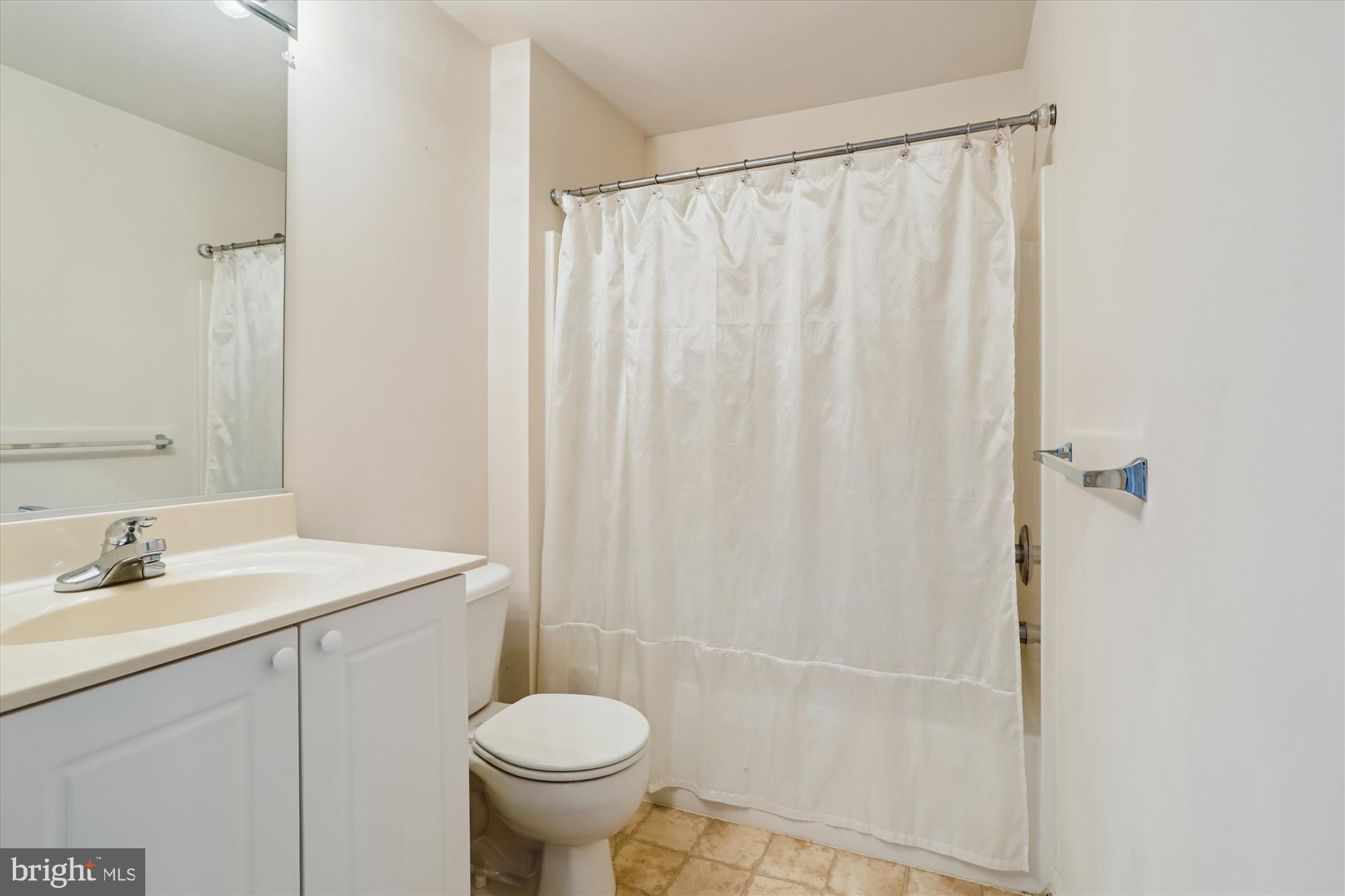 2500 Coleridge Drive, Unit 2A Frederick, MD 21702 - Photo 30 of 60 a bathroom with a sink toilet and shower