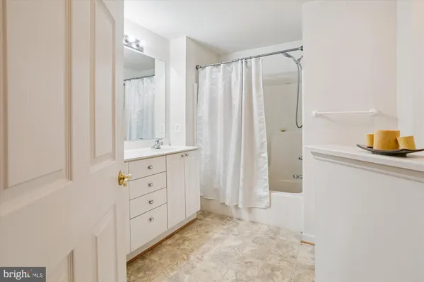 a view of a cars park in front of building