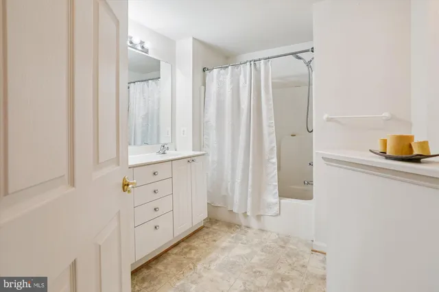 a view of a cars park in front of building