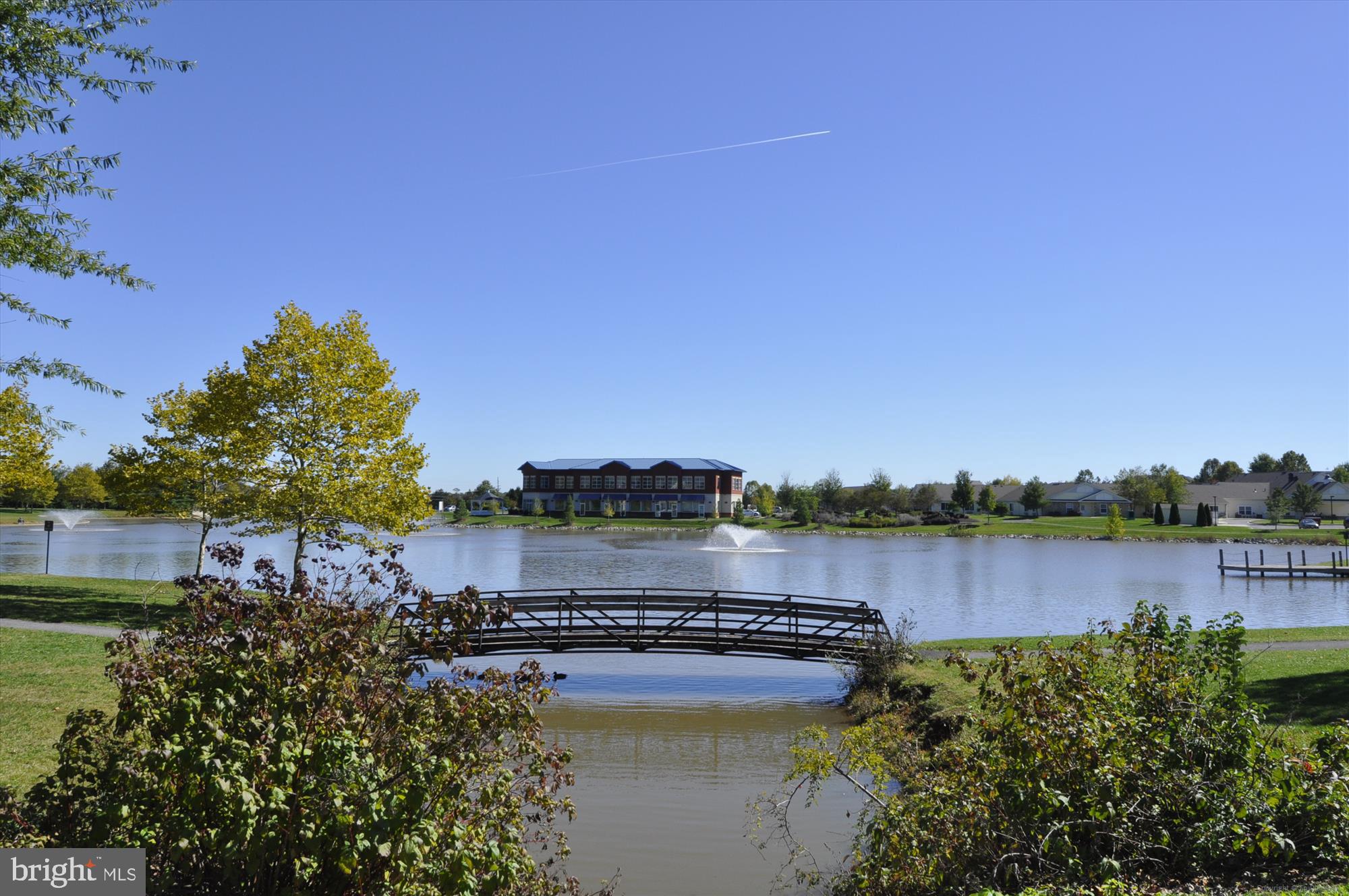2500 Coleridge Drive, Unit 2A Frederick, MD 21702 - Photo 41 of 60 a view of a lake with houses in the back
