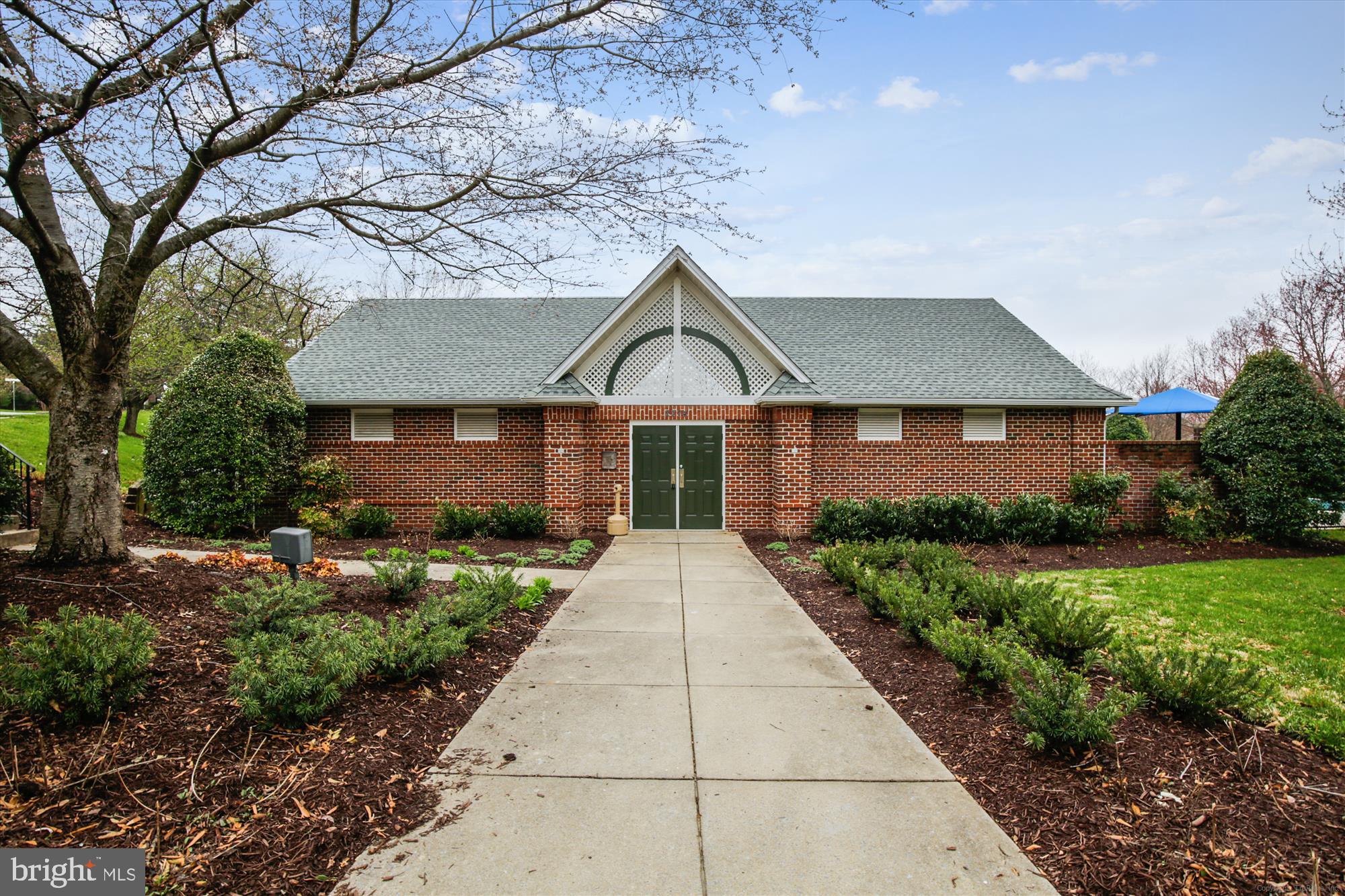 2500 Coleridge Drive, Unit 2A Frederick, MD 21702 - Photo 42 of 60 a front view of a house with yard and green space