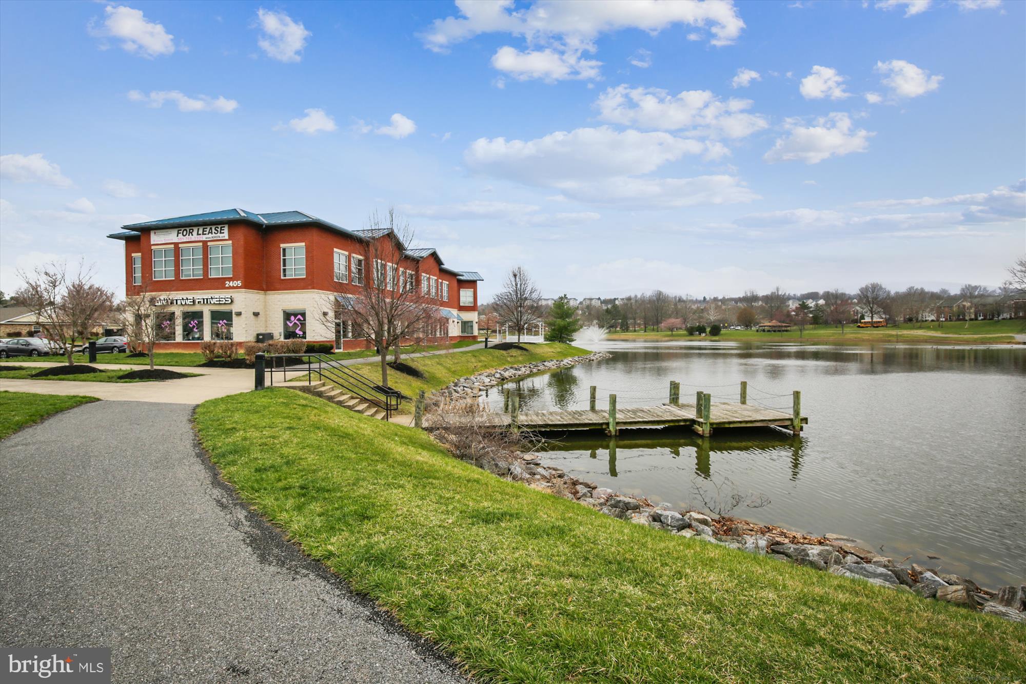 2500 Coleridge Drive, Unit 2A Frederick, MD 21702 - Photo 44 of 60 a view of a lake with a house in the background