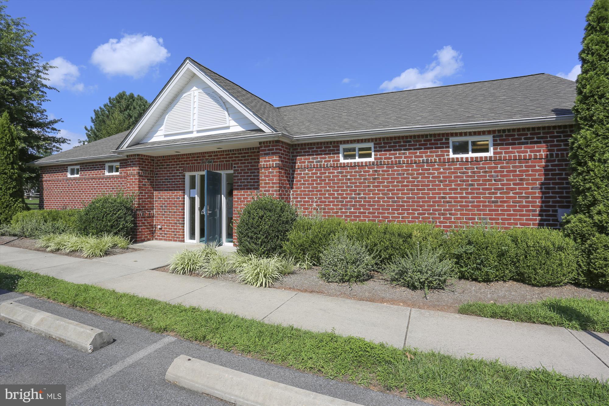 2500 Coleridge Drive, Unit 2A Frederick, MD 21702 - Photo 48 of 60 a front view of a house with a yard