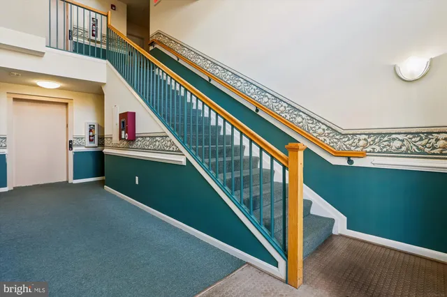 a view of a hallway with closet area