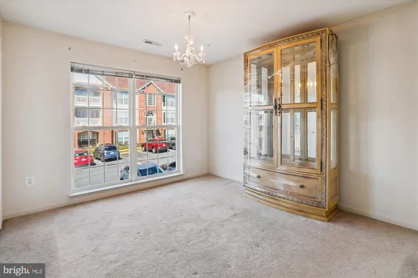 a kitchen with stainless steel appliances a refrigerator sink and cabinets