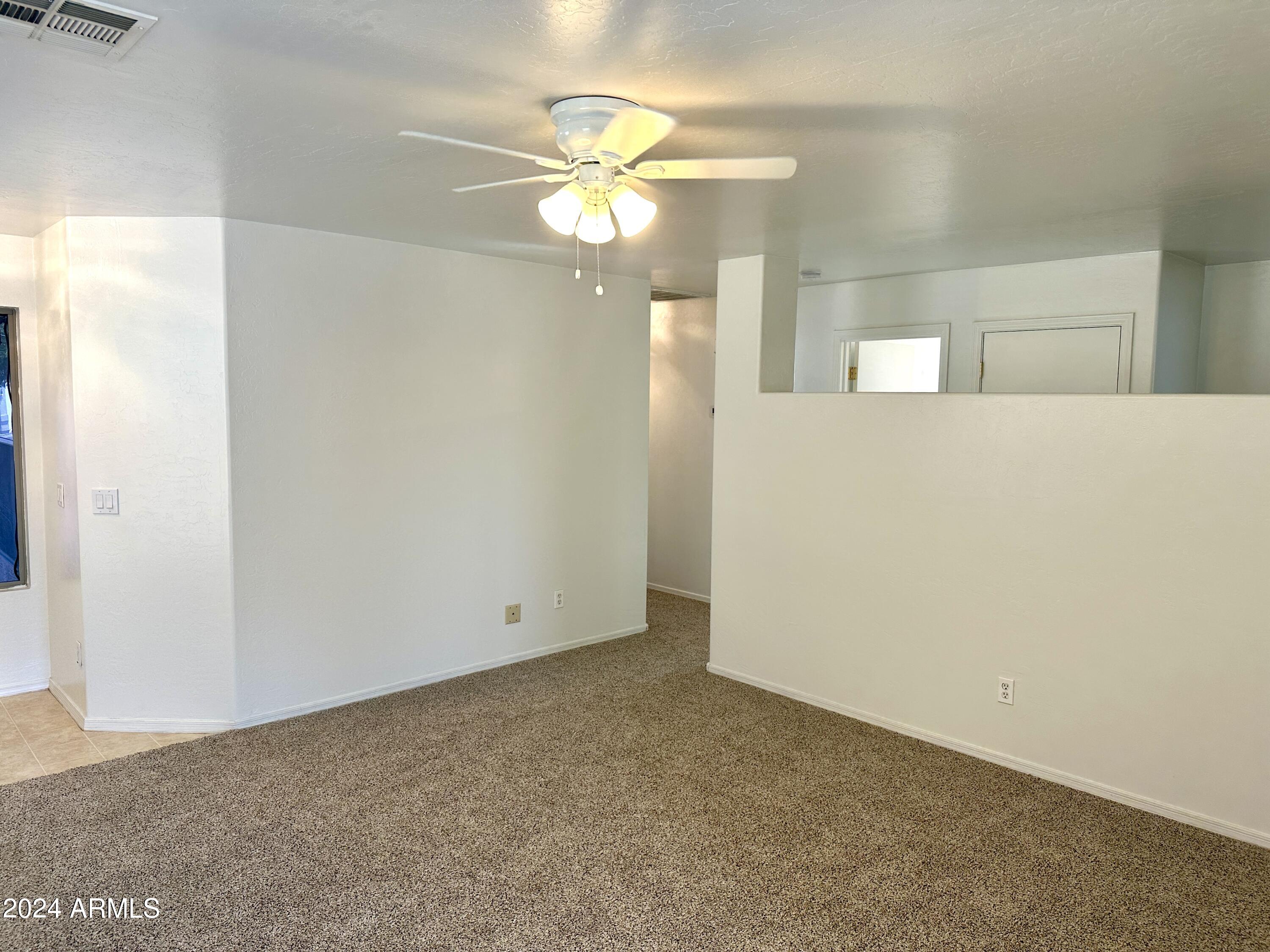 14829 West Redfield Road Surprise, AZ 85379 - Photo 8 of 26 Great room 2