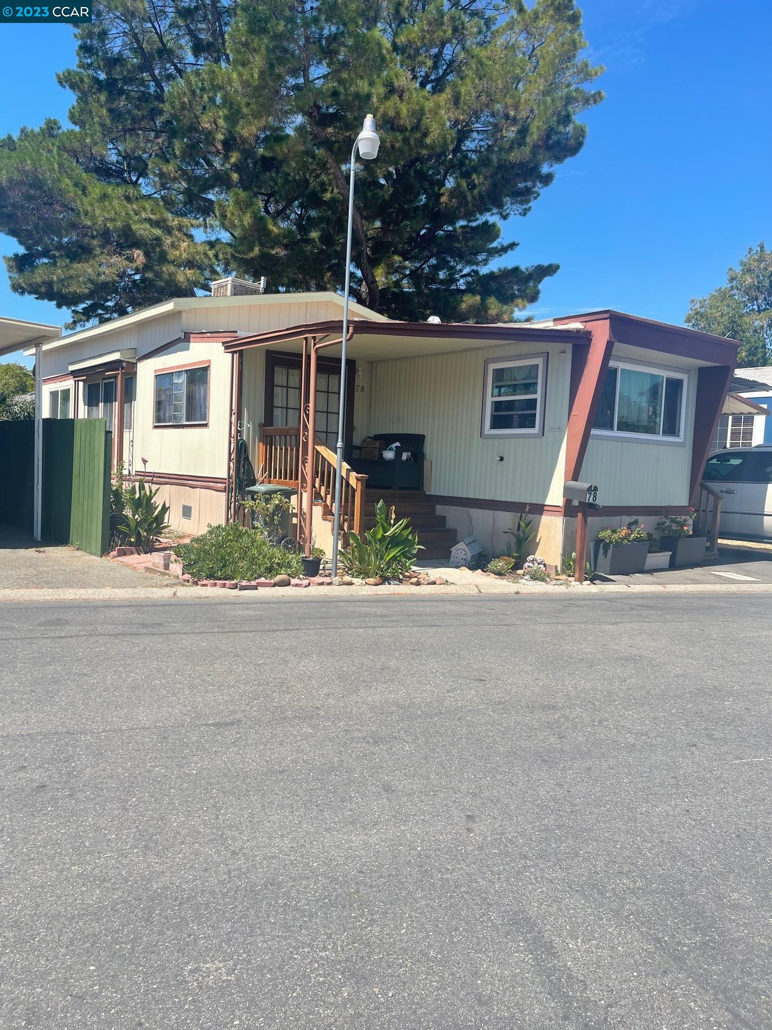 front view of a house with a patio
