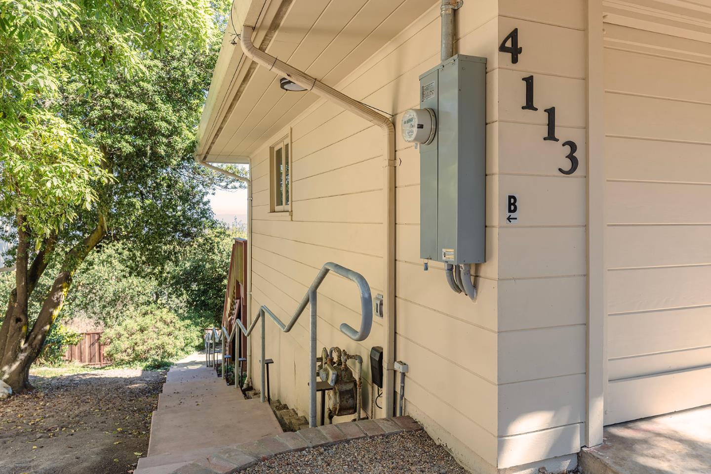 4113 Crest Road Pebble Beach, CA 93953 - Photo 13 of 15 a bathroom with a sink and a mirror