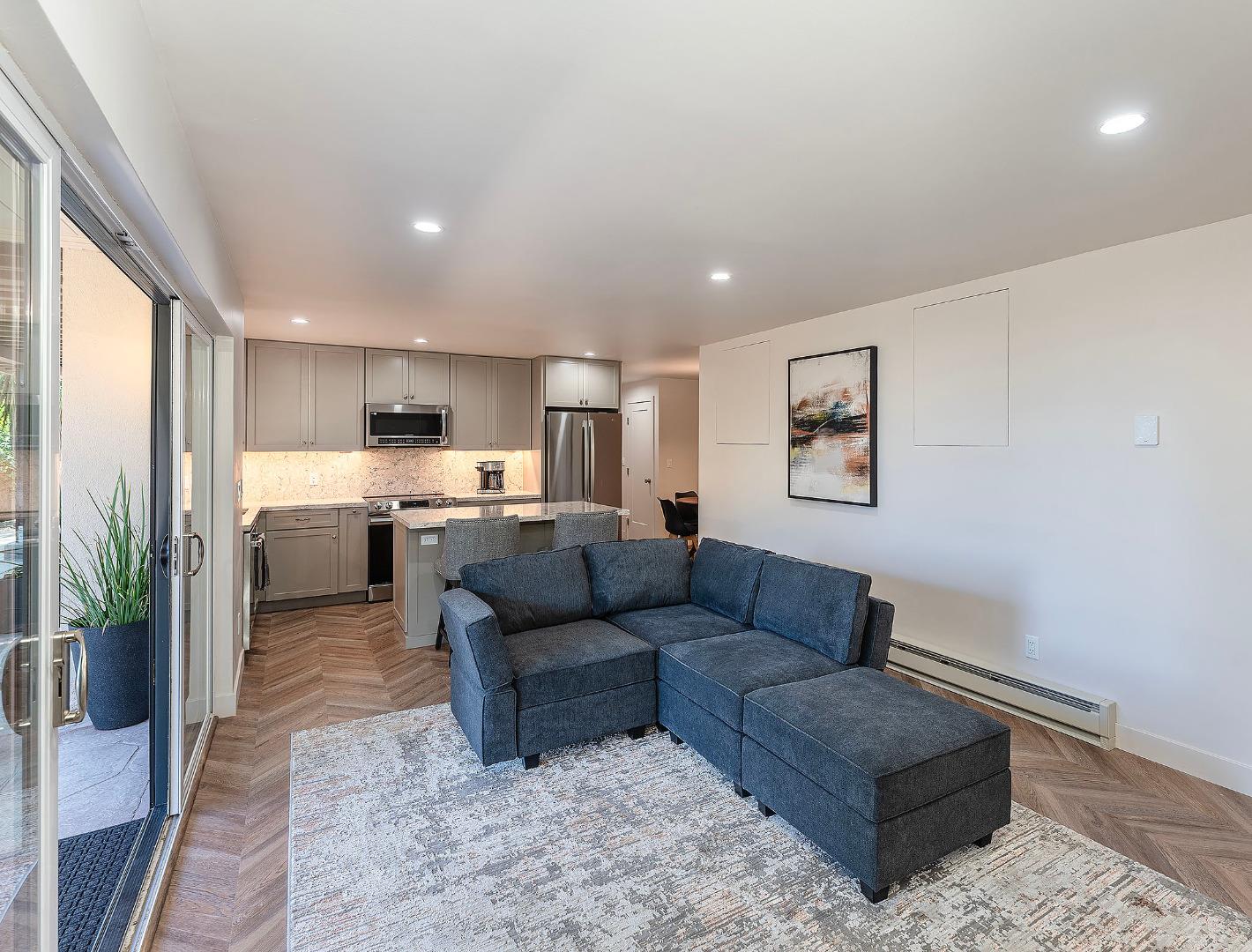 4113 Crest Road Pebble Beach, CA 93953 - Photo 4 of 15 a living room with furniture and a kitchen view