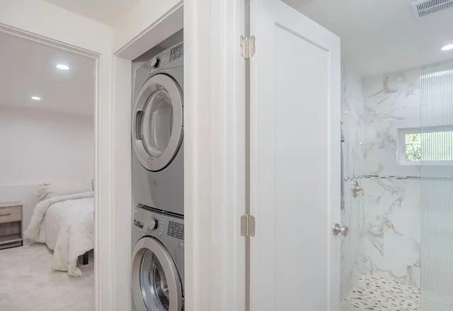 a utility room with dryer and washer