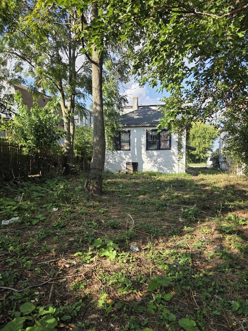 1745 West Steuben Street Chicago, IL 60643 - Photo 3 of 3 a front view of a house with garden