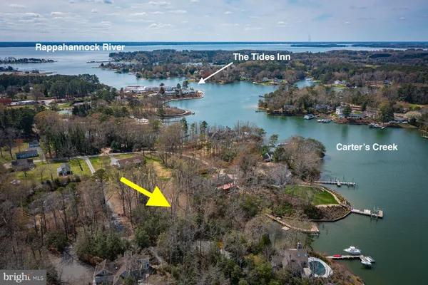 an aerial view of lake residential house with outdoor space