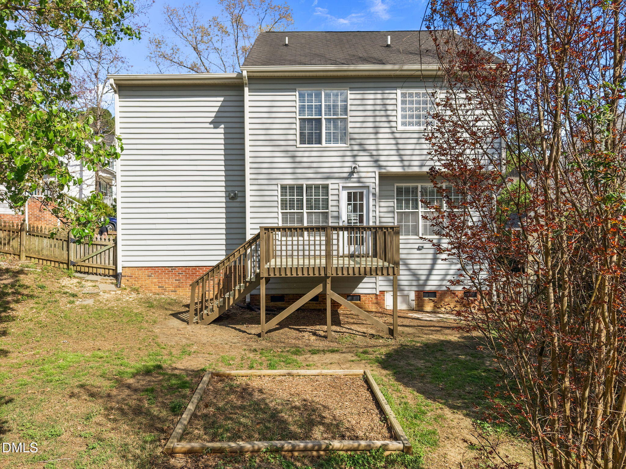 9220 Pennythorne Court Raleigh, NC 27615 - Photo 37 of 49 a view of a porch with a bench