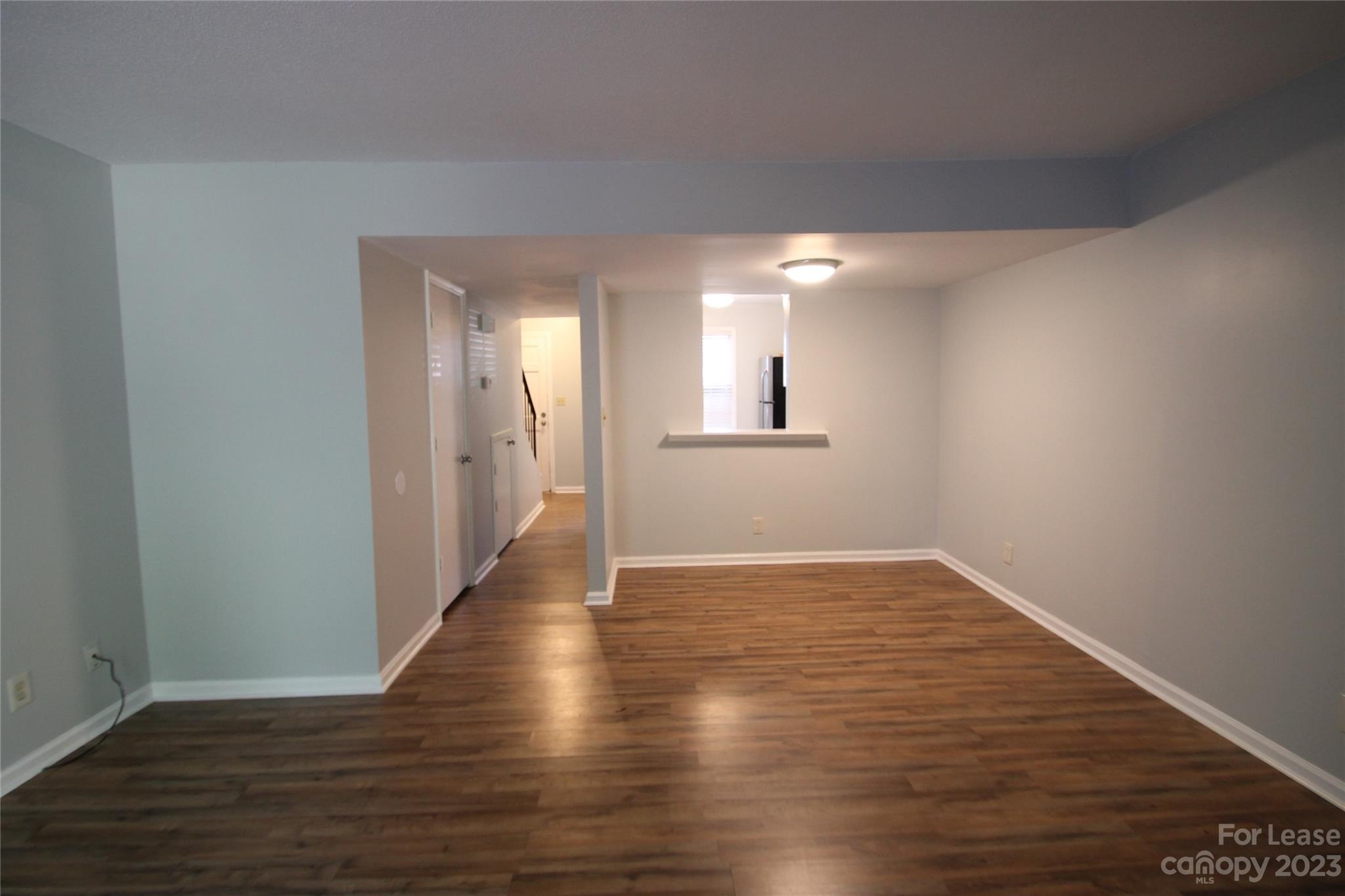 1788 Ebenezer Road Rock Hill, SC 29732 - Photo 11 of 30 a view of an empty room with wooden floor and a window