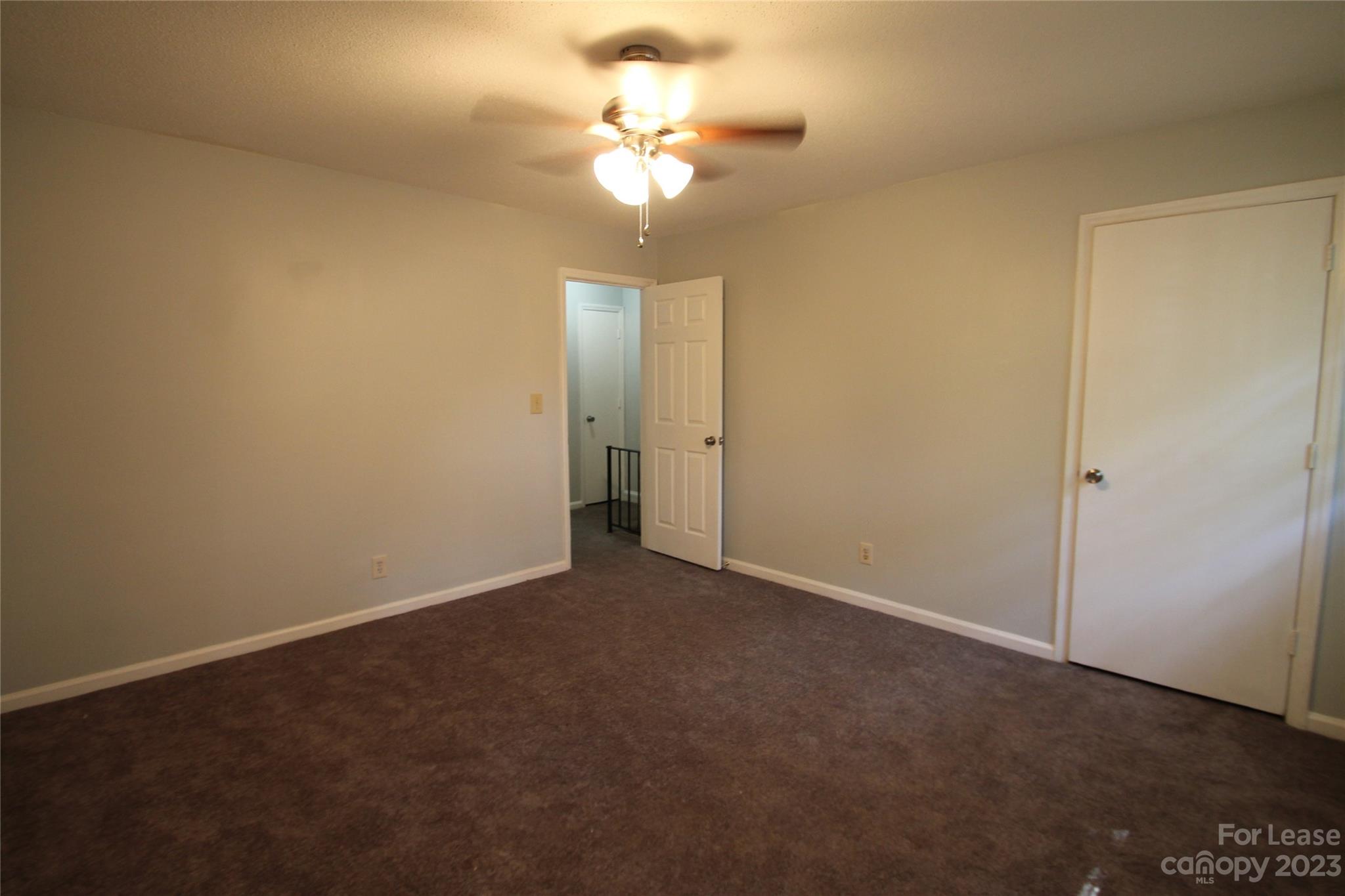 1788 Ebenezer Road Rock Hill, SC 29732 - Photo 20 of 30 a view of a room with a chandelier fan