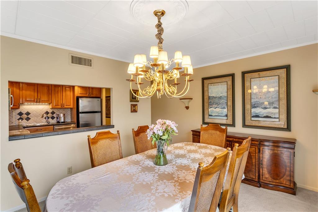 900 Washington Road, Unit 412 Pittsburgh, PA 15228 - Photo 17 of 34 a dining room with furniture and window