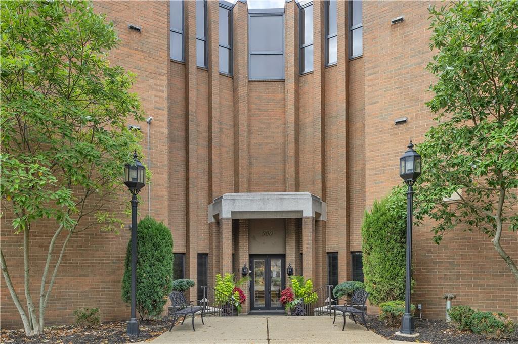 900 Washington Road, Unit 412 Pittsburgh, PA 15228 - Photo 2 of 34 a front view of a building with plants